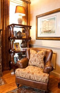Pairing leather and fabric on a club chair, interior design in Nashville by Eric Ross Interiors.