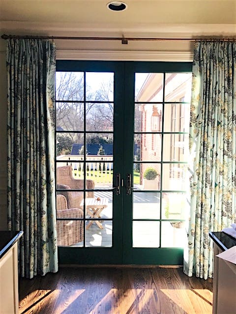 Nashville interior design by Eric Ross Interiors, green interior doors and curtains made from Miles Redd Schumacher fabric.
